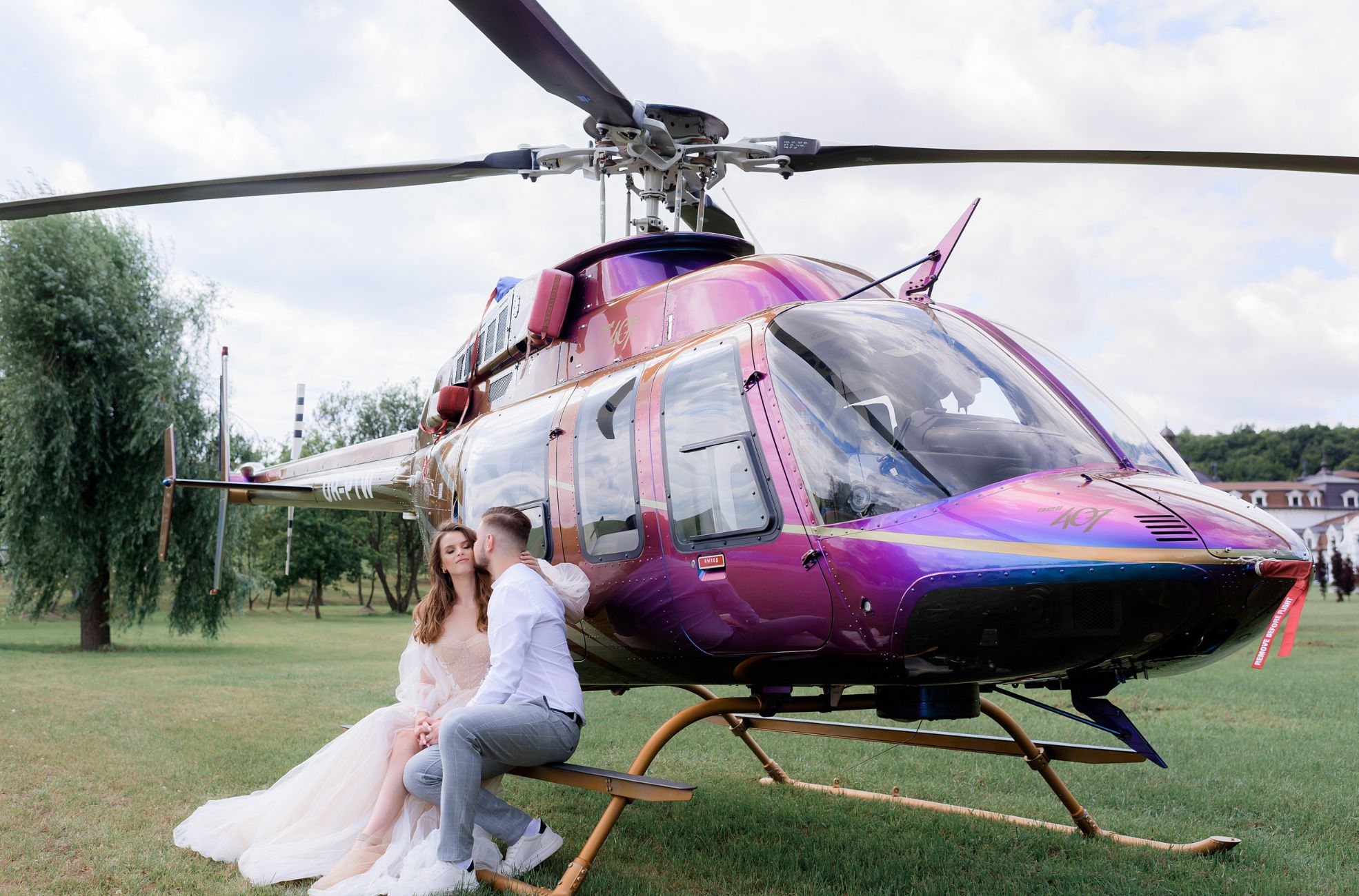 Couple Arriving In Helicopter