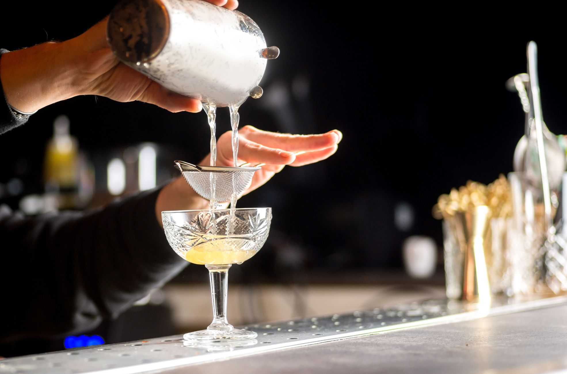 Person Making A Cocktail