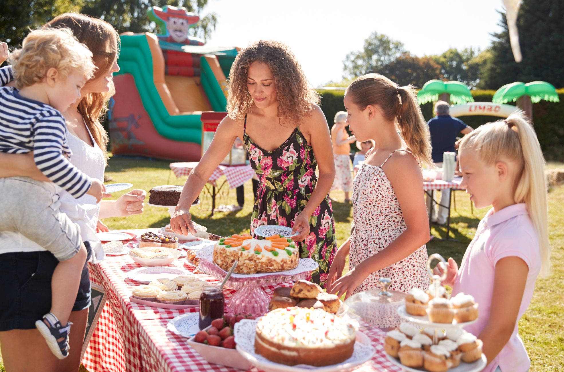 People Serving Food At School Fete