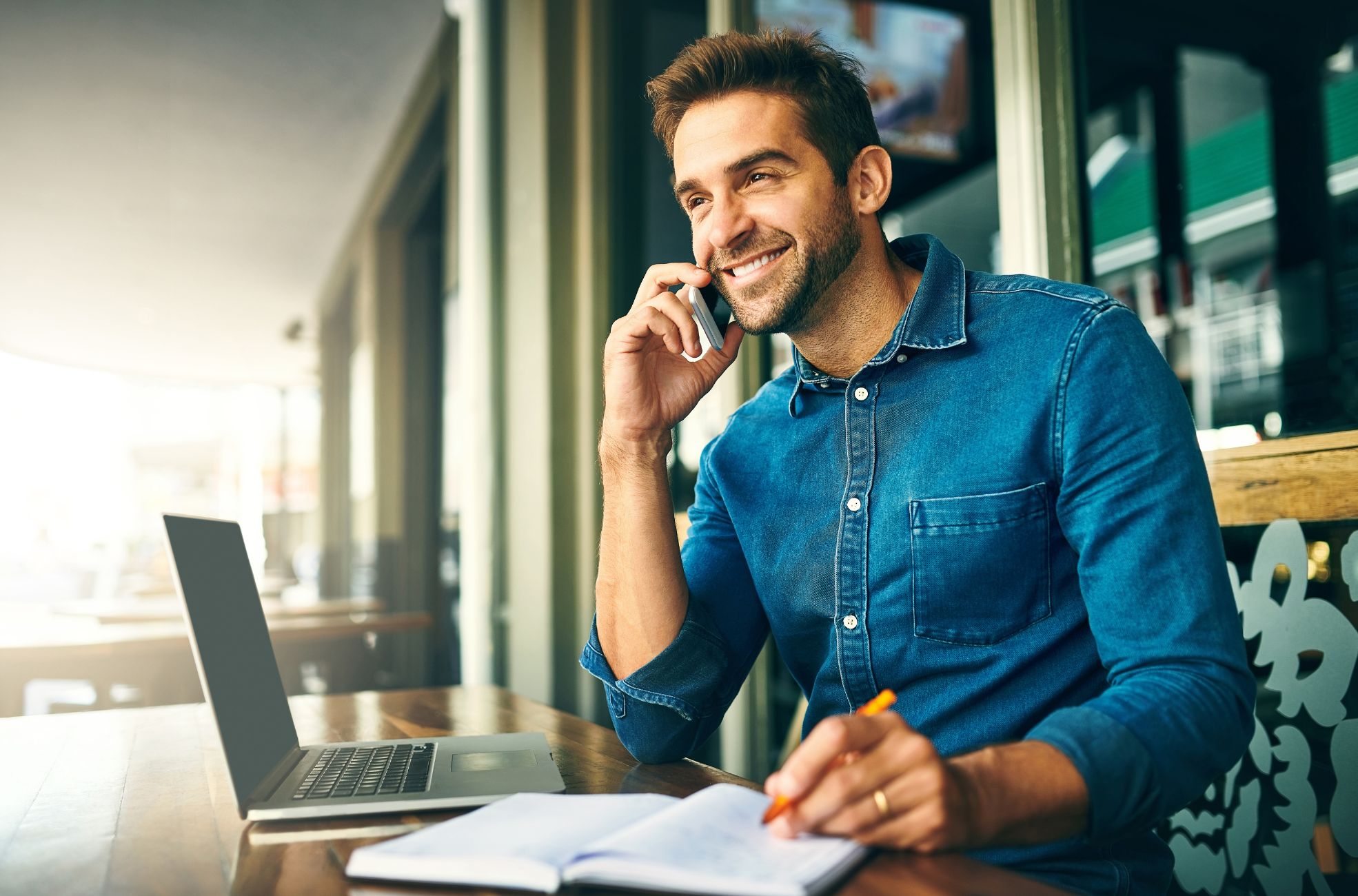 Man With Phone And Laptop